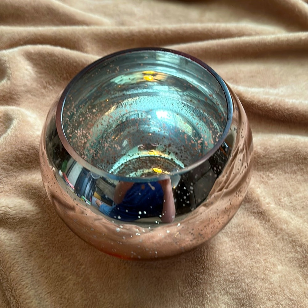 Rose Gold colored bubble vase, intended as a candle holder.